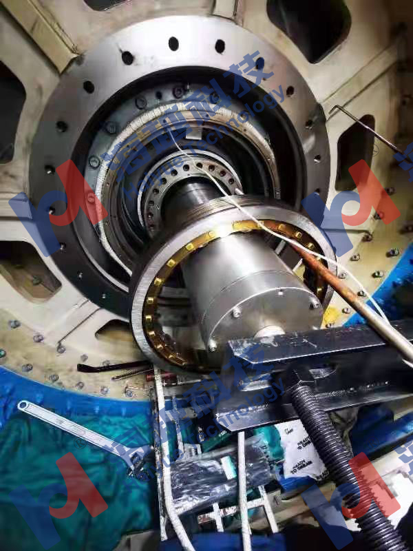 140m高風(fēng)電塔旋轉(zhuǎn)軸承檢修，軸承的熱拆熱裝。 軸承直徑約300mm，熱拆溫度80℃?，F(xiàn)場實(shí)際只纏繞1-2圈即可拆下。